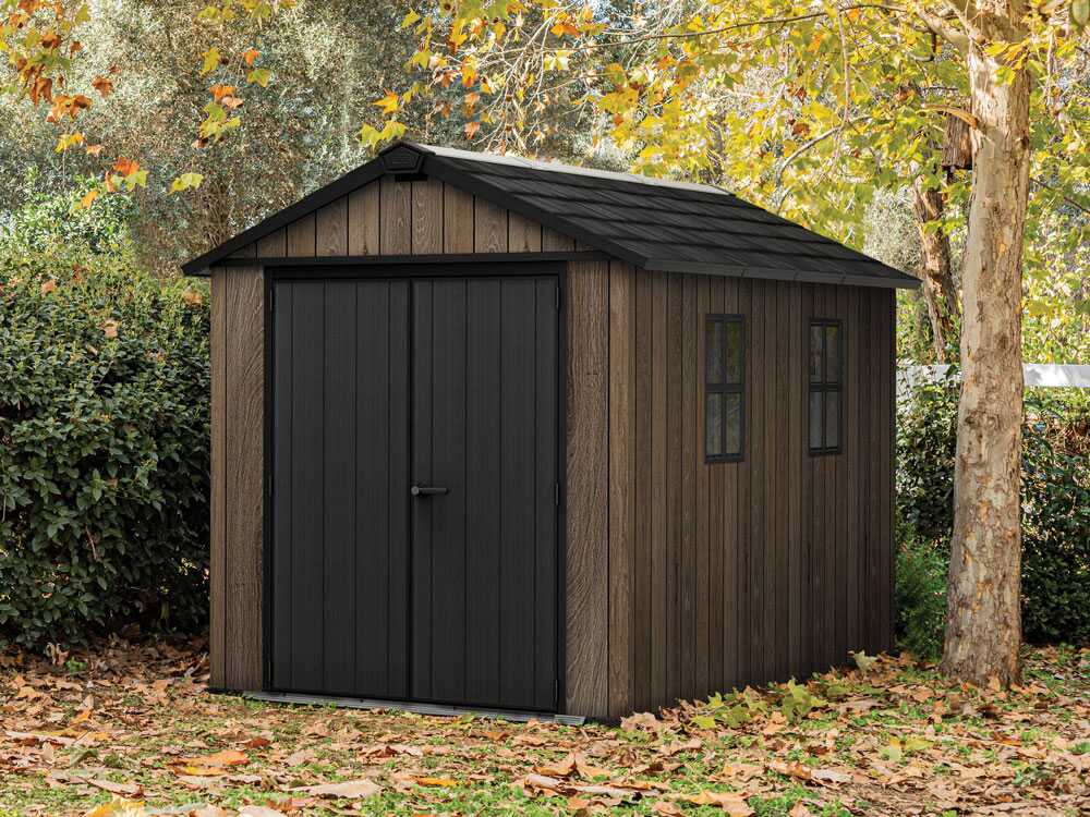keter-signature-walnut-7511-1175-gertehaus-mit-fenstern-230-x-350-x-246-cm-gartenhaus-aus-kunstharz-signature-walnut-7511-1175-68874_1_1764153605_IMG_6926d905021f9.jpg Keter Signature Walnut 7511/1175 – Gerätehaus – Mit Fenstern – 230 x 350 x 246 cm – Image 1